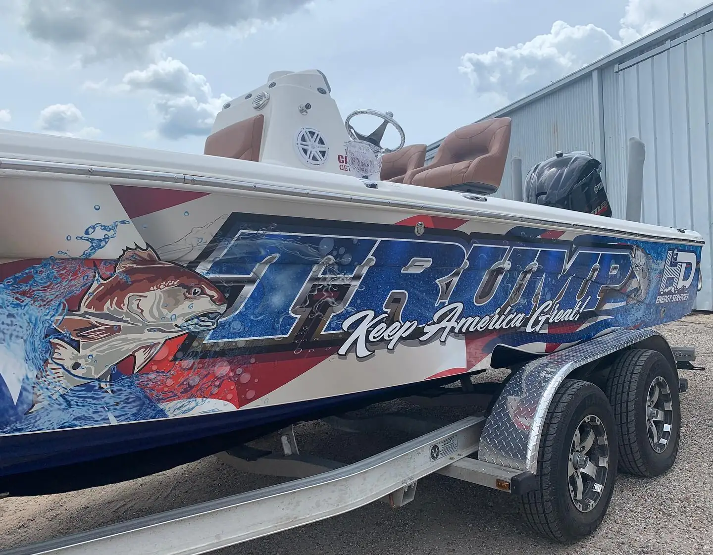 Marine lettering and accent graphics on a boat transom