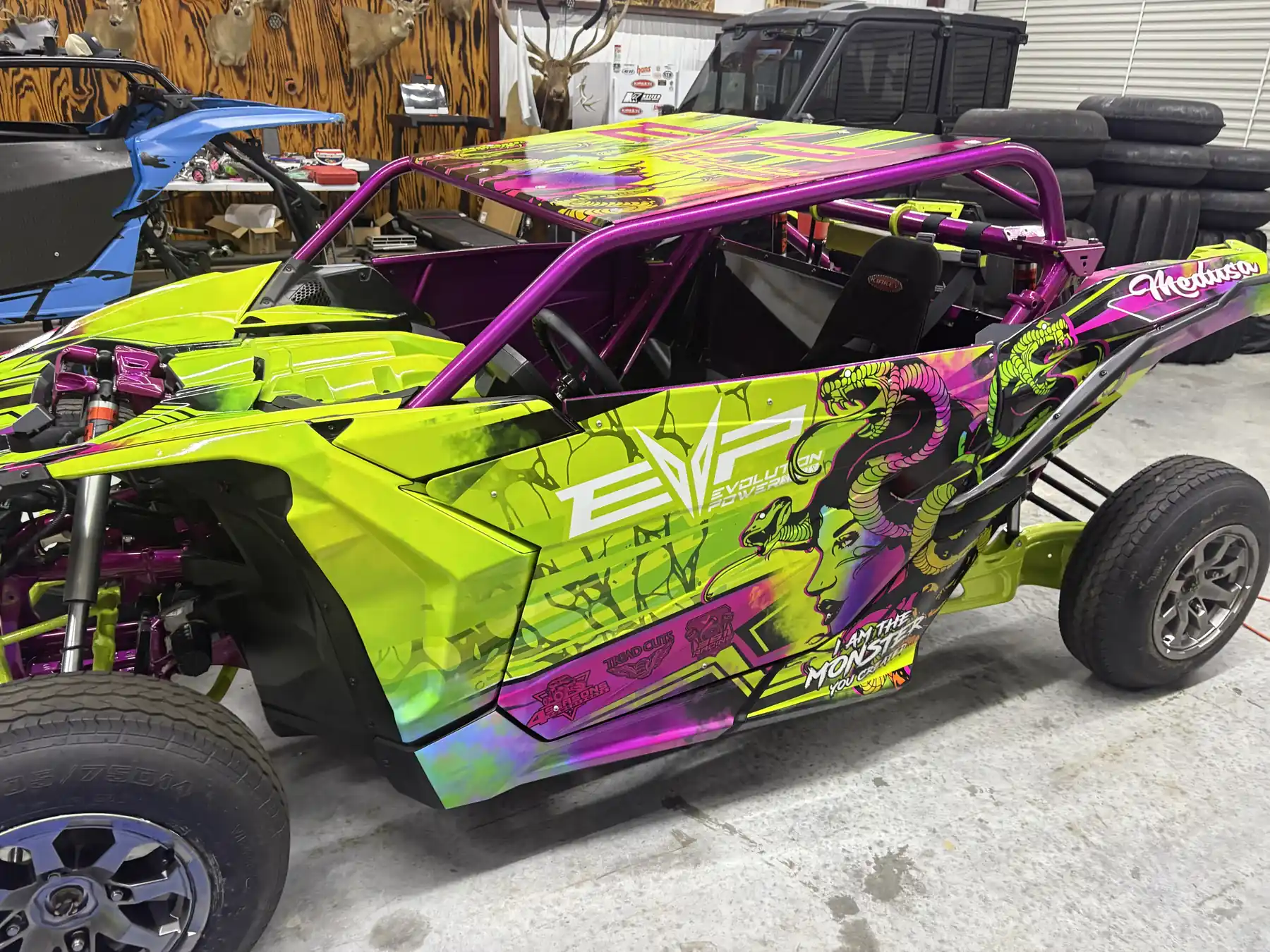 Custom green specialty vehicle wrap installed by The Wrap Guys