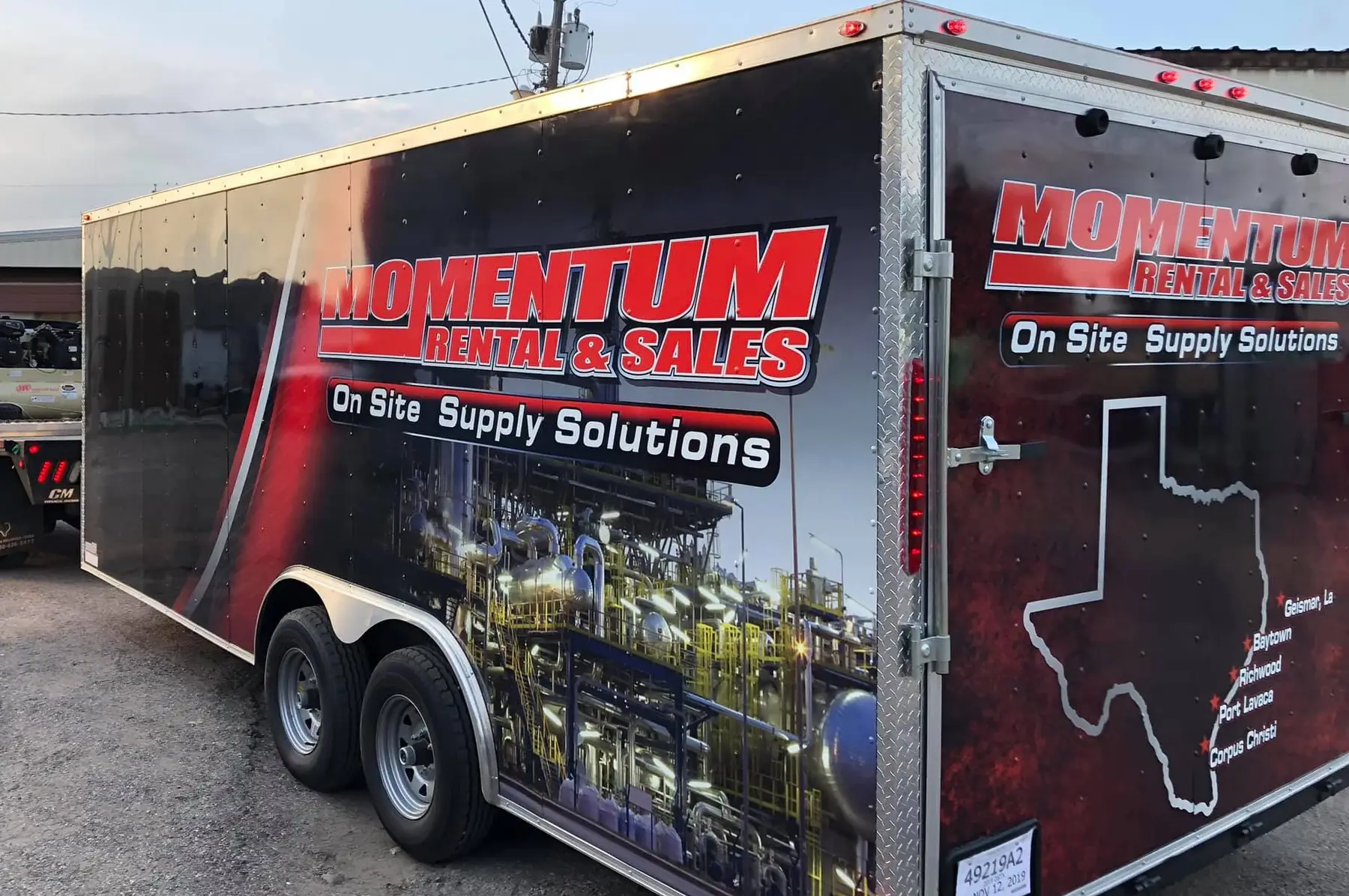 Wrapped enclosed trailer produced by The Wrap Guys