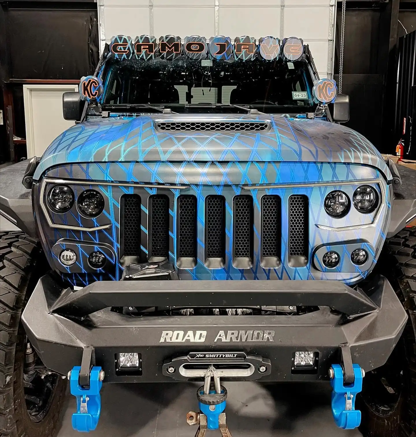 Custom color-change vehicle wrap on a Jeep