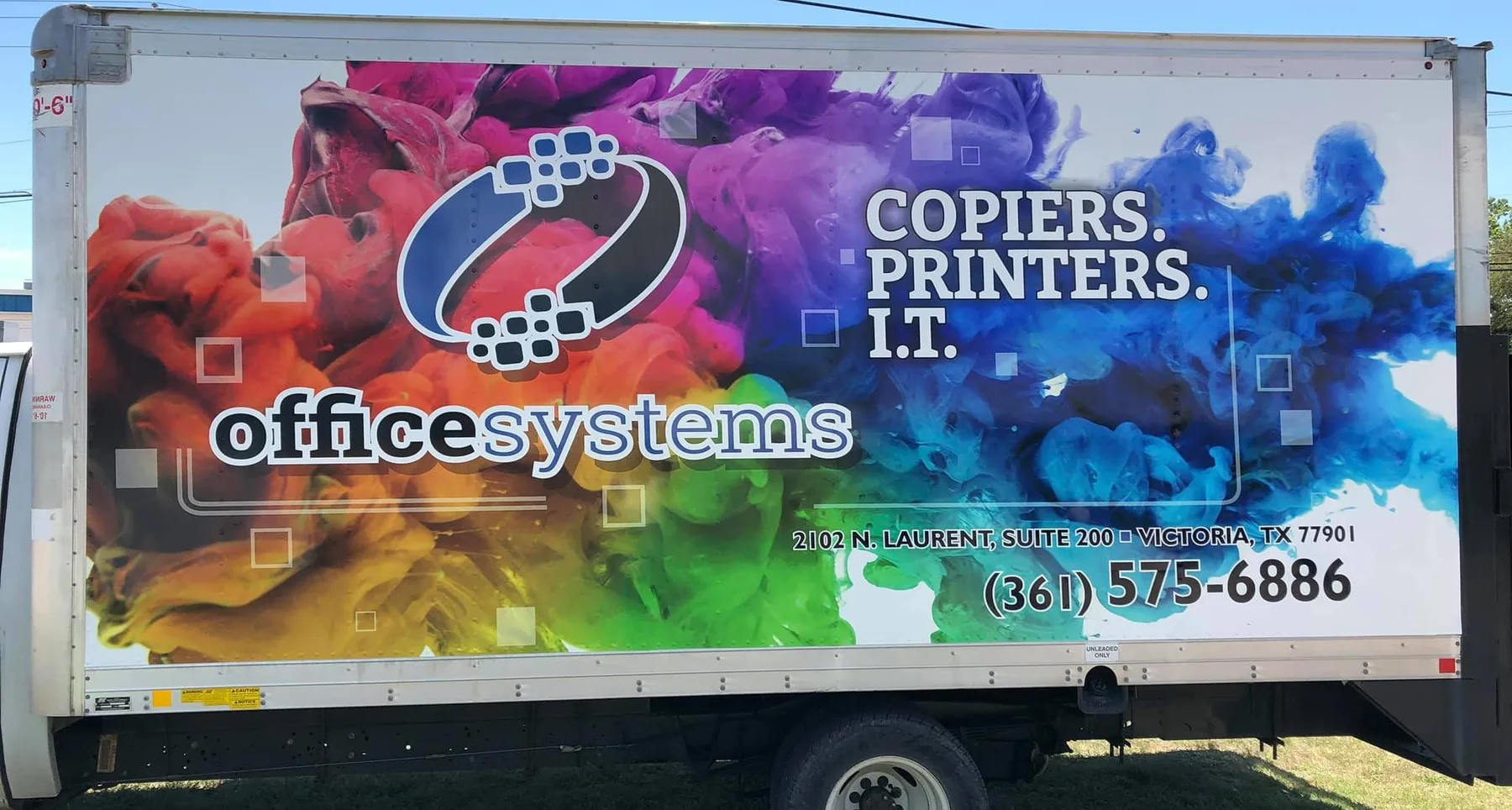 Office Systems box truck wrapped with colorful ink-cloud graphics for copiers, printers, and IT services