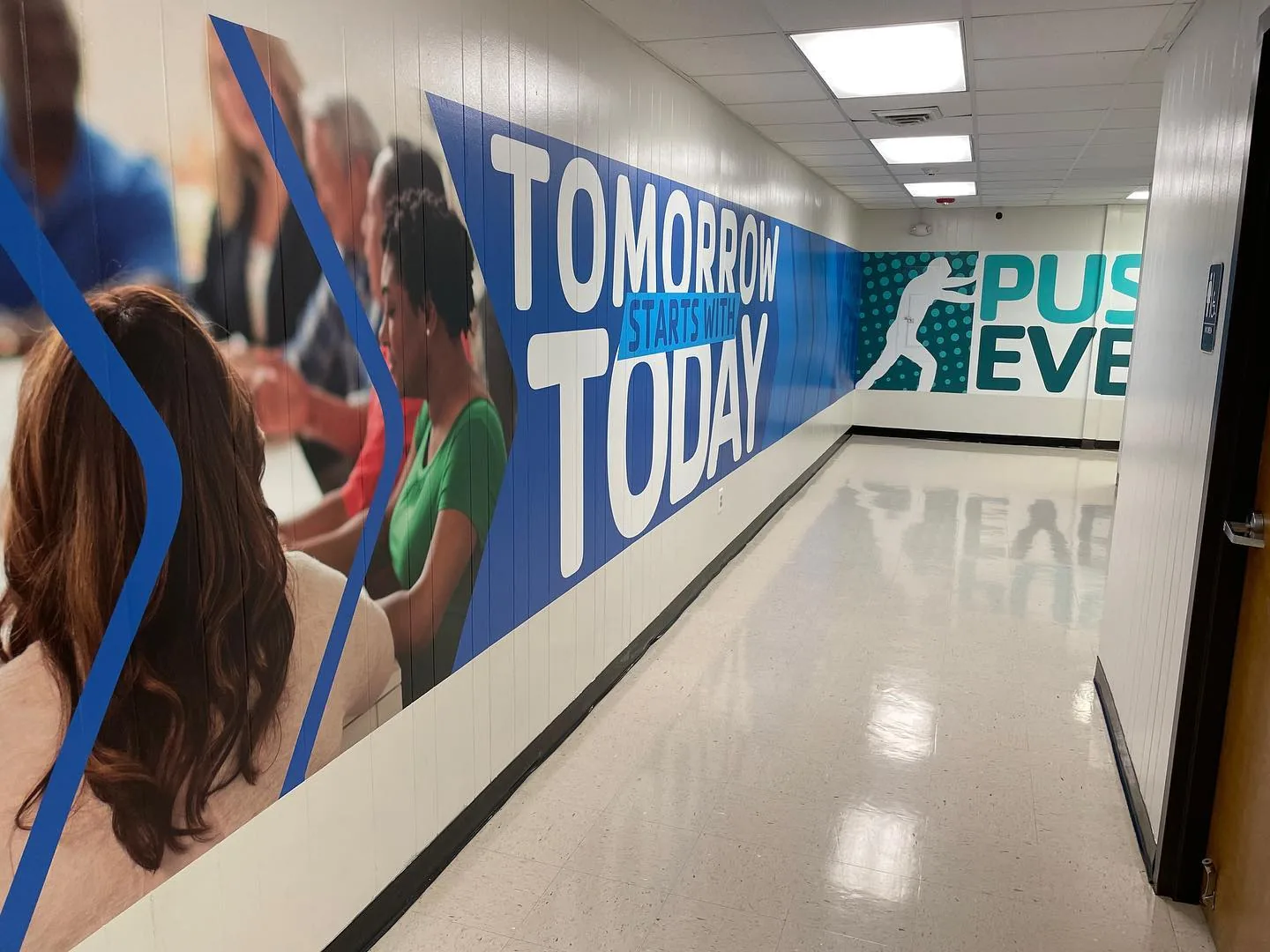 Interior corridor wall graphics installed by The Wrap Guys